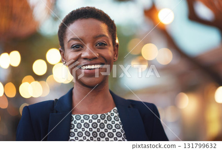 Smile, confident black woman and portrait in a city with bokeh, lights and blurred background space. Face, traveller and happy African American person in town for fun, break or trip on the weekend 131799632