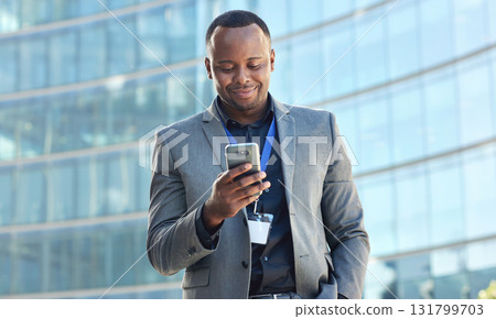 Business, black man and phone typing in city for connection, notification and digital contact. Happy urban worker, mobile and technology for social networking, internet management or 5g digital media 131799703
