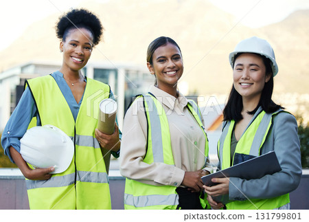 Engineering, team and portrait of a construction workers on a site outdoor in the city in collaboration. Teamwork, colleagues and group of female industrial employees planning a building project. 131799801