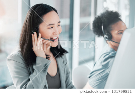 Call center, consulting and asian woman at computer in office for customer service, telemarketing and help desk. Happy, smile and contact us with consultant for technical support, advisory and sales 131799831