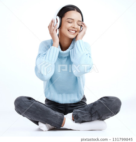 Music headphones, woman and smile in white background, isolated studio and floor. Happy female model listening to sound, streaming album and audio connection of song, podcast subscription and radio 131799845
