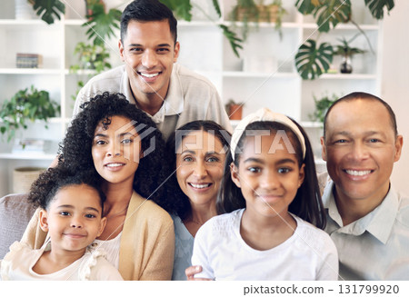 Family in happy portrait with kids, parents and grandparents on sofa with smile in home in Brazil. Happiness, generations of men and women with children, people spending time together making memories 131799920