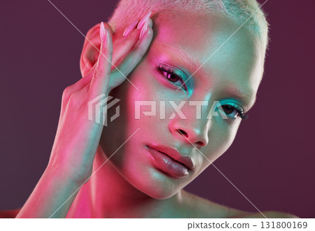 Skincare, beauty and cyberpunk, portrait of woman with neon makeup and lights for creative advertising on studio background. Art girl, cosmetics and model isolated for futuristic face mockup Skincare, beauty and cyberpunk, portrait of woman with neon makeup and lights for creative advertising on studio background. Art girl, cosmetics and model isolated for futuristic face mockup 131800169