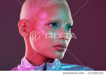 Vaporwave profile, black woman and cyberpunk cosmetics with model thinking in a studio. Isolated, glow makeup and futuristic cyber fashion of a young person with chrome clothing and scifi design 131800192