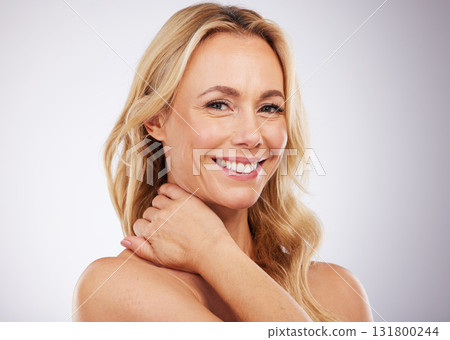 Beauty, mature woman and portrait of skincare, face wellness and self care in a studio. Isolated, white background and female model with smile from dermatology, spa and cosmetic treatment with mockup Beauty, mature woman and portrait of skincare, face wellness and self care in a studio. Isolated, white background and female model with smile from dermatology, spa and cosmetic treatment with mockup 131800244