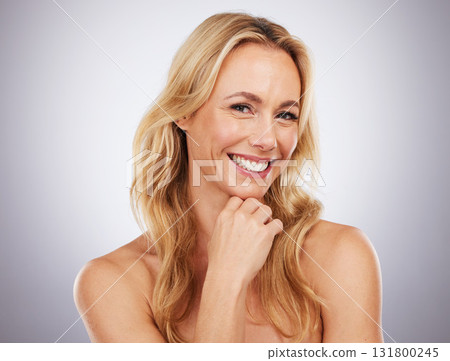 Mature, woman and beauty facial portrait of skincare, wellness and self care in a studio. Isolated, white background and female model with happy smile from dermatology, spa and cosmetic treatment 131800245