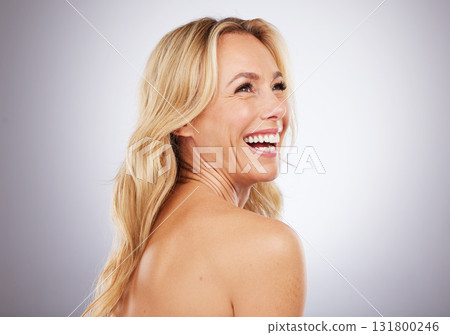 Happy, skincare and mature woman in studio for beauty, wellness and grooming on grey background space. Cosmetic, body care and female model relax in luxury, hygiene and dermatology while isolated 131800246