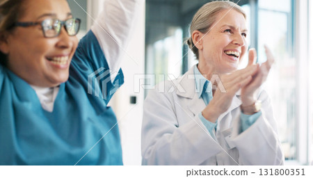 Medical, team celebration and doctors applause, praise or congratulation for mission success, healthcare or meeting news. Teamwork, winner or hospital nurses, surgeon or excited for achievement Medical, team celebration and doctors applause, praise or congratulation for mission success, healthcare or meeting news. Teamwork, winner or hospital nurses, surgeon or excited for achievement 131800351