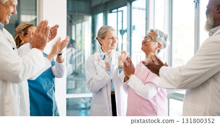 Success, team celebration and doctors applause, praise or excited for medical promotion, healthcare or bonus. Teamwork, winner or hospital nurses, surgeon group or mature woman with thank you gesture Success, team celebration and doctors applause, praise or excited for medical promotion, healthcare or bonus. Teamwork, winner or hospital nurses, surgeon group or mature woman with thank you gesture 131800352