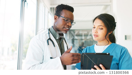 Tablet, collaboration or team of doctors talking about healthcare results, medicine report or planning clinic service. Reading, communication or medical nurses, surgeon or people teamwork on research 131800366