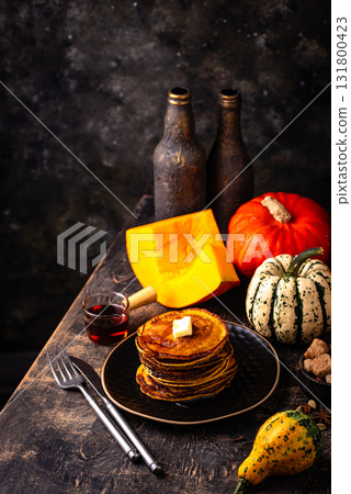 Pumpkin pancakes with maple syrup Pumpkin pancakes with maple syrup 131800423