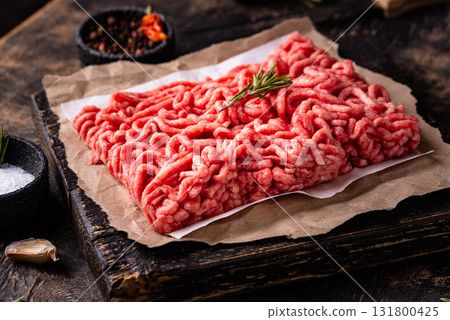 Raw minced meat on dark background 131800425