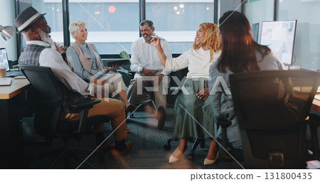 Creative people, meeting and laughing at night for funny joke in team building or project planning at office. Group of employees working late in fun teamwork discussion, startup or deadline together Creative people, meeting and laughing at night for funny joke in team building or project planning at office. Group of employees working late in fun teamwork discussion, startup or deadline together 131800435