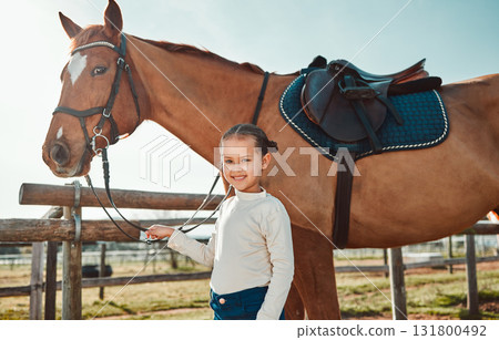 Horse, smile and portrait of girl in countryside for equestrian race, riding and happy in nature. Smile, young and care with child jockey and pet on animal ranch for adventure, peace and freedom Horse, smile and portrait of girl in countryside for equestrian race, riding and happy in nature. Smile, young and care with child jockey and pet on animal ranch for adventure, peace and freedom 131800492