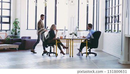 Meeting, partnership and employees in designer office for planning and strategy discussion at startup agency. Business people, collaboration and design team sharing plan, creative vision and ideas. 131800631