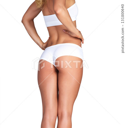 Buttocks, body and underwear with a model woman in studio isolated on a white background for skincare. Bum, panties and legs with a female standing on blank mockup space to promote fitness or health Buttocks, body and underwear with a model woman in studio isolated on a white background for skincare. Bum, panties and legs with a female standing on blank mockup space to promote fitness or health 131800640