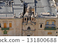 View of old building with windows, balconies in city. Republic of Malta, the picturesque city of Valetta, Malta. 131800688