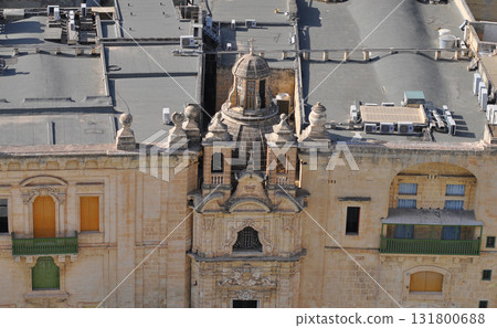 View of old building with windows, balconies in city. Republic of Malta, the picturesque city of Valetta, Malta. View of old building with windows, balconies in city. Republic of Malta, the picturesque city of Valetta, Malta. 131800688