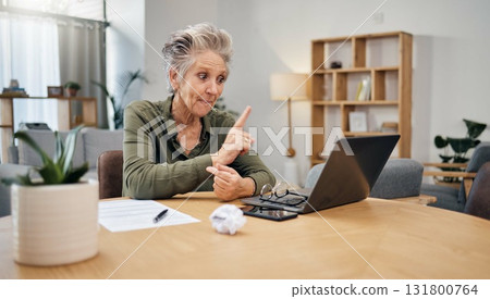 Serious senior woman on video call for investment, retirement or financial virtual communication with paperwork. Documents, taxes and elderly person talking on laptop for client experience or problem 131800764