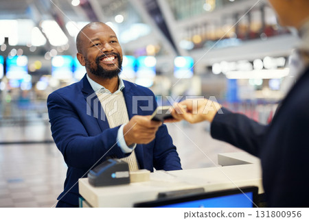 Black man, giving passport and airport for travel, security and identity for global transportation service. African businessman, documents and concierge for immigration with international transport Black man, giving passport and airport for travel, security and identity for global transportation service. African businessman, documents and concierge for immigration with international transport 131800956