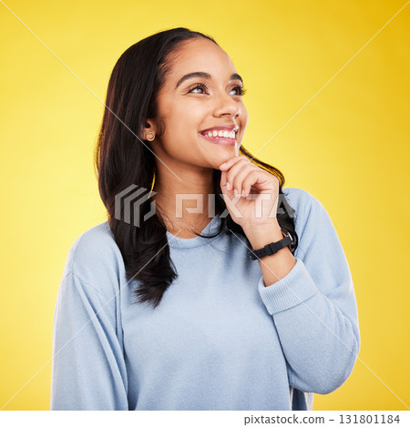 Yellow background, thinking and face of woman with smile for advertising, promotion and mockup space. Ideas, thoughtful and isolated girl in studio with happy mindset, positive attitude and confident 131801184