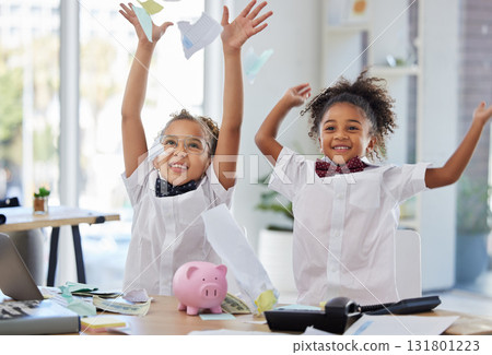 School, holiday and children celebrating in a classroom for a vacation break feeling happy and excited throwing papers in the air. Education, business and happiness by young kids or girls winning 131801223