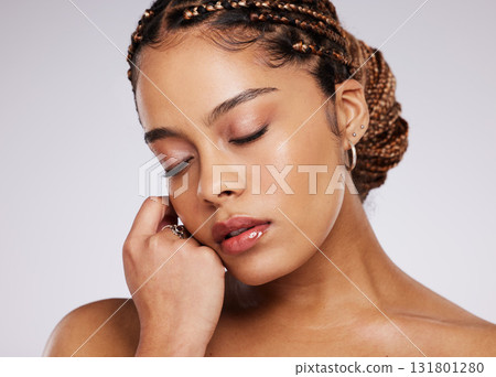 Beauty, face and black woman with skincare, cosmetics glow and peace with wellness on studio background. Natural cosmetic care, hand and makeup with beautiful female, mockup space and dermatology Beauty, face and black woman with skincare, cosmetics glow and peace with wellness on studio background. Natural cosmetic care, hand and makeup with beautiful female, mockup space and dermatology 131801280