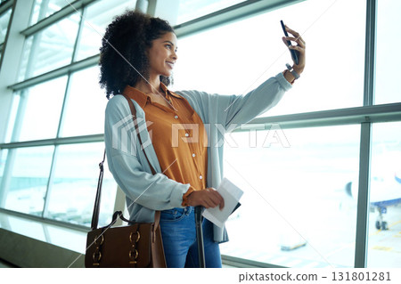 Travel, phone and selfie with black woman at airport for social media, departure and vacation. Tourism, flight and smile with passenger with passport by window for journey, pictures and holiday Travel, phone and selfie with black woman at airport for social media, departure and vacation. Tourism, flight and smile with passenger with passport by window for journey, pictures and holiday 131801281