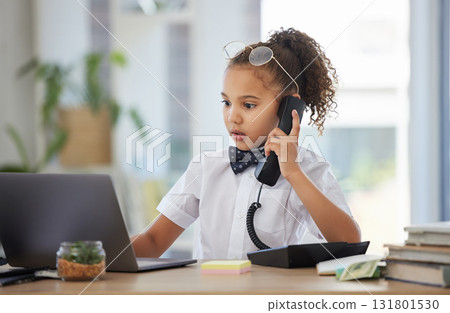Children, telephone and a girl having fun in an office as a fantasy businesswoman at work on a laptop. Kids, phone call and a female child working at a desk while using her imagination to pretend Children, telephone and a girl having fun in an office as a fantasy businesswoman at work on a laptop. Kids, phone call and a female child working at a desk while using her imagination to pretend 131801530