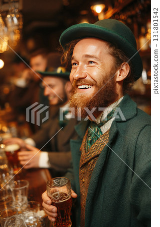 Cheerful man in green celebrating St Patrick's Day with beer and bar patrons Cheerful man in green celebrating St Patrick's Day with beer and bar patrons 131801542
