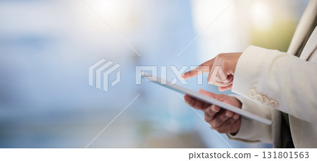 Hands, tablet and planning strategy for digital marketing, advertising or social media against blurred background. Hand of employee manager holding touchscreen for online browsing or plan on mockup 131801563