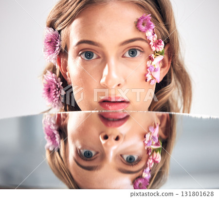 Beauty face, portrait and mirror woman with flower product, sustainable agriculture and natural skincare reflection. Makeup, nature plant cosmetics and eco friendly girl isolated on studio background 131801628