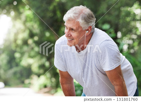 Senior man, tired and outdoor with music earphones for run, workout and training on road for fitness. Elderly male person happy about cardio exercise for health and wellness on running, rest or break Senior man, tired and outdoor with music earphones for run, workout and training on road for fitness. Elderly male person happy about cardio exercise for health and wellness on running, rest or break 131801760