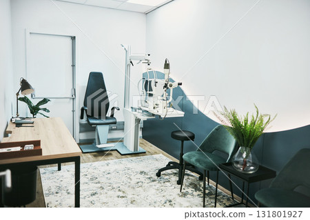 Medical, ophthalmology and laser in empty room of clinic for eye exam, laser and consulting. Healthcare, technology and interior design with nobody and machine in office for optometry and medicine 131801927