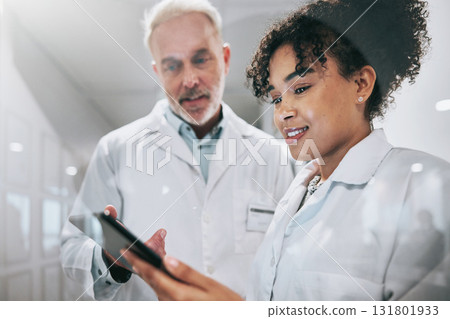 Doctors, tablet and clinic, health team and communication, digital medical document or test results. Partnership, window and senior man with black woman, conversation and technology in healthcare 131801933