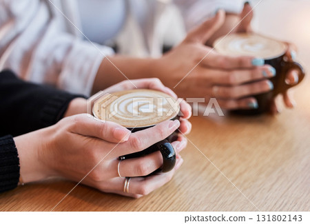 Coffee, morning and hands of people with cups at a cafe for bonding, breakfast and conversation. Restaurant, relax and friends drinking a latte, warm beverage or drink from a mug at a diner together Coffee, morning and hands of people with cups at a cafe for bonding, breakfast and conversation. Restaurant, relax and friends drinking a latte, warm beverage or drink from a mug at a diner together 131802143