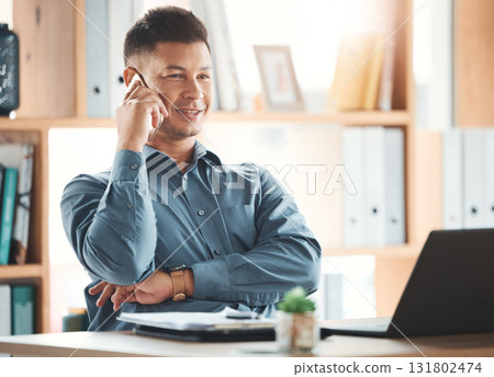 Office, laptop and man on phone call at desk with smile, crm and b2b communication at advisory startup. Business manager, conversation and networking, happy businessman speaking on smartphone at work 131802474