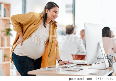 Pregnant, computer and business woman typing in office workplace working on project. Pregnancy, maternity and happy worker, female or mother on desktop planning, research or writing report in company Pregnant, computer and business woman typing in office workplace working on project. Pregnancy, maternity and happy worker, female or mother on desktop planning, research or writing report in company 131802949