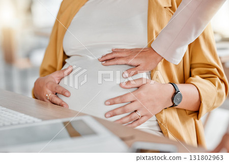Pregnant woman, hand touch and stomach closeup of women in a office ready for work. Pregnancy, new mother and co working showing mama support by touching abdomen in the workplace with care and love Pregnant woman, hand touch and stomach closeup of women in a office ready for work. Pregnancy, new mother and co working showing mama support by touching abdomen in the workplace with care and love 131802963