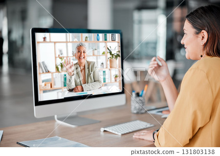 Video call, computer and business women wave in office, talking and chatting in virtual chat. Technology, communication and employees or people waving in online meeting, webinar or digital discussion Video call, computer and business women wave in office, talking and chatting in virtual chat. Technology, communication and employees or people waving in online meeting, webinar or digital discussion 131803138