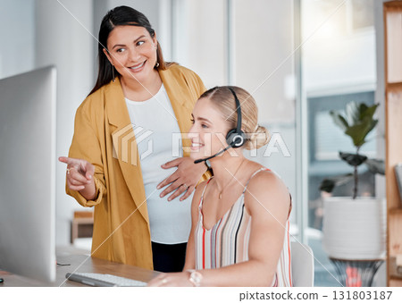 Call center, coaching and pointing at computer in office with pregnant woman, smile and learning at desk. Women, happy manager and desktop with tech support, customer service and workplace education Call center, coaching and pointing at computer in office with pregnant woman, smile and learning at desk. Women, happy manager and desktop with tech support, customer service and workplace education 131803187