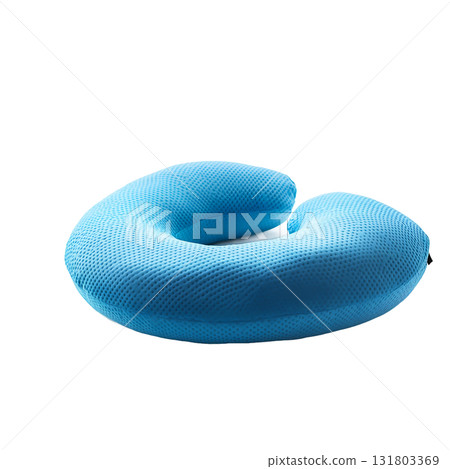 Blue textured memory foam Ushaped pillow is displayed in a detailed studio shot on transparent background 131803369