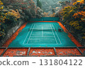 Aerial view of a tennis court surrounded by autumn foliage and vibrant colors 131804122