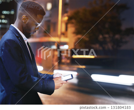 Phone, business and black man in city at night, street or outdoors in town for texting. 5g mockup, technology and male employee with smartphone for social media, internet browsing or web scrolling. 131804183