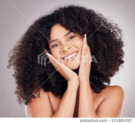 Portrait, beauty and afro with a model black woman in studio on a gray background for hair or skincare. Face, salon and aesthetic with an attractive young female posing to promote keratin treatment Portrait, beauty and afro with a model black woman in studio on a gray background for hair or skincare. Face, salon and aesthetic with an attractive young female posing to promote keratin treatment 131804267