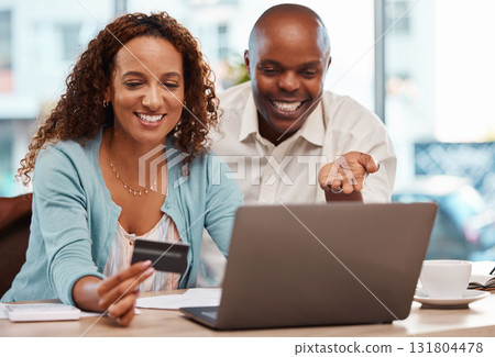 Laptop, credit card and couple online shopping in home, payment or digital banking. Ecommerce, computer and happy black man and mature woman with fintech, sales or interracial purchase on web store. 131804478