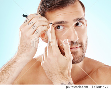 Hair removal, eyebrows and tweezers with face of man for grooming, hygiene and beauty. Cosmetology, treatment and facial growth with model and tool for morning routine, trimming and cleaning Hair removal, eyebrows and tweezers with face of man for grooming, hygiene and beauty. Cosmetology, treatment and facial growth with model and tool for morning routine, trimming and cleaning 131804577