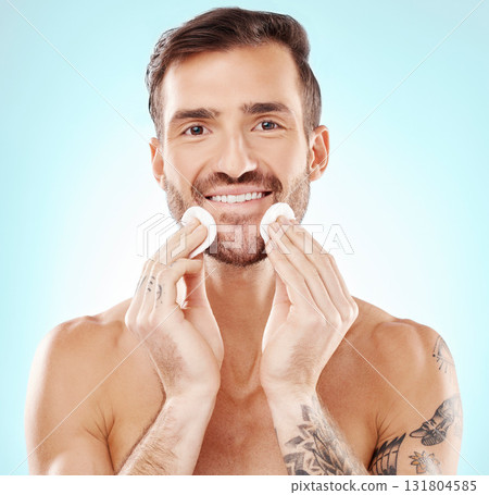 Smile, skincare and cotton with portrait of man for toner, makeup remover and hydration cosmetics. Facial, wellness and spa treatment with model and cleaning face for self care, glow and dermatology Smile, skincare and cotton with portrait of man for toner, makeup remover and hydration cosmetics. Facial, wellness and spa treatment with model and cleaning face for self care, glow and dermatology 131804585
