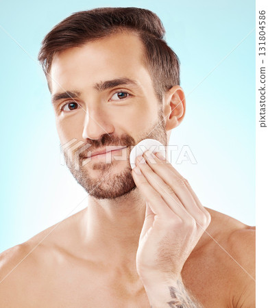 Happy, skincare and cotton with portrait of man for toner, makeup remover and hydration cosmetics. Facial, wellness and spa treatment with model and cleaning face for self care, glow and dermatology Happy, skincare and cotton with portrait of man for toner, makeup remover and hydration cosmetics. Facial, wellness and spa treatment with model and cleaning face for self care, glow and dermatology 131804586