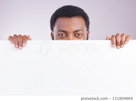 Mockup, space and portrait of a black man with a board isolated on a white background in a studio. Showing, branding and an African person peaking from a blank poster with mock up for advertisement Mockup, space and portrait of a black man with a board isolated on a white background in a studio. Showing, branding and an African person peaking from a blank poster with mock up for advertisement 131804664